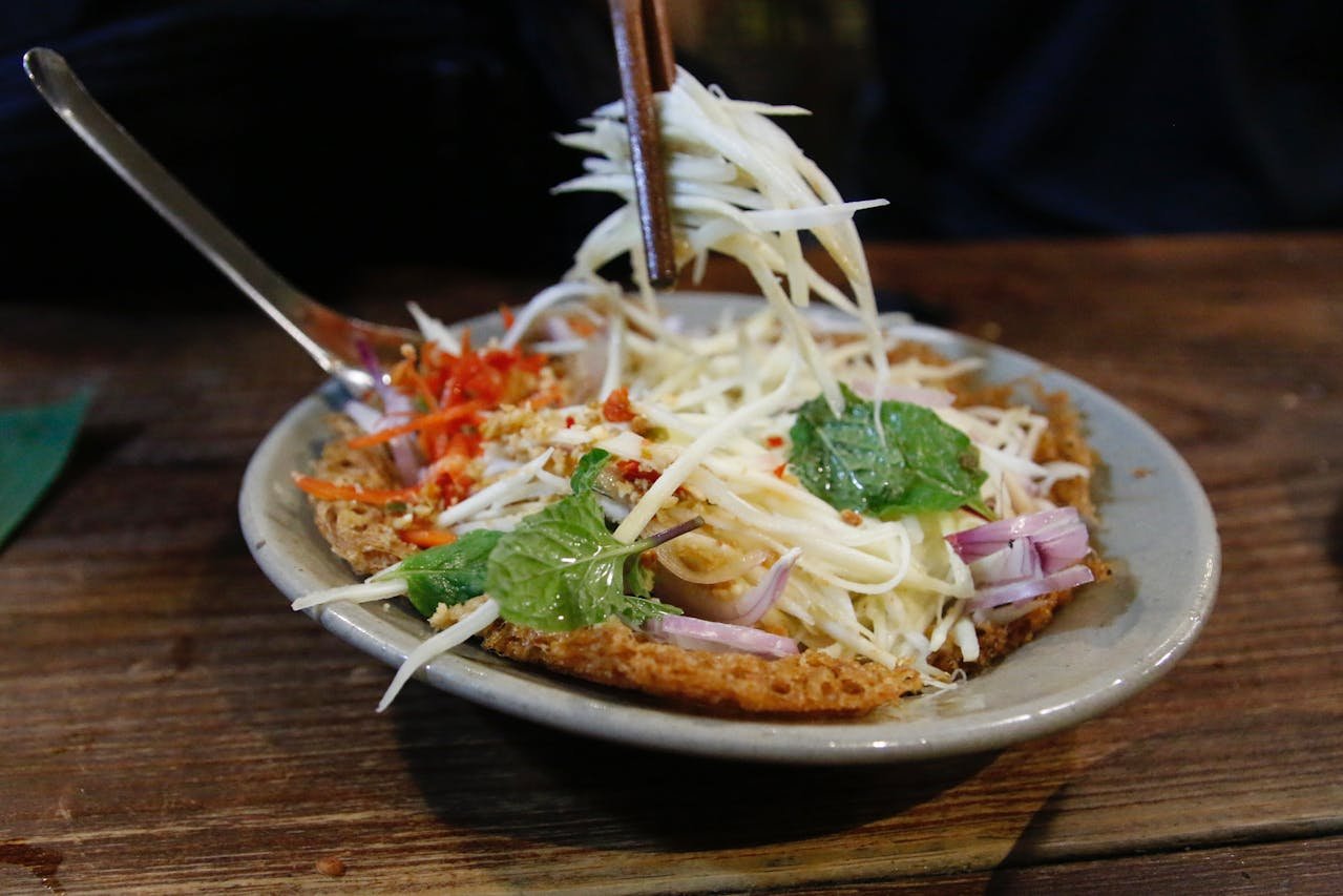 Delicious Thai Papaya Salad with Fresh Ingredients