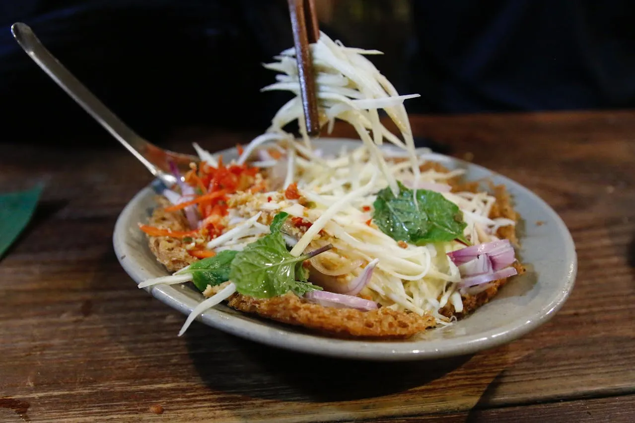 Delicious Thai Papaya Salad with Fresh Ingredients