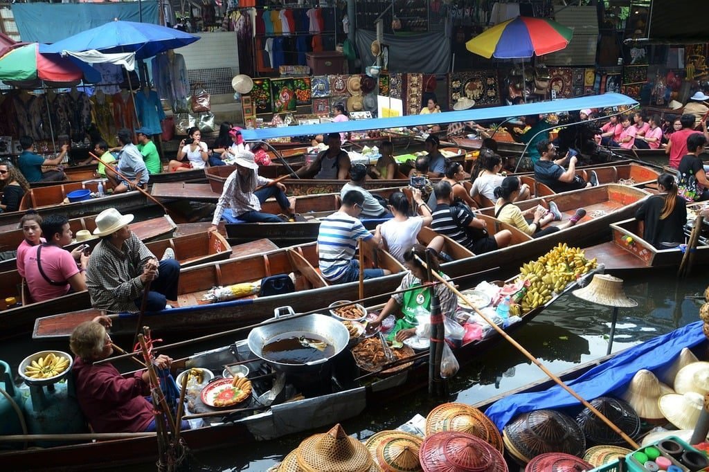 A bustling floating market scene in Bangkok,