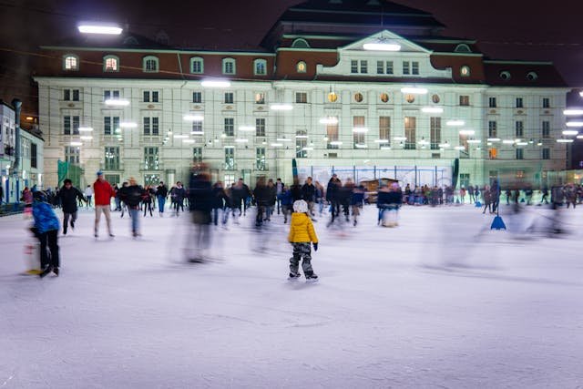 People Ice Skating in front of Hotel in Vienna, Austria