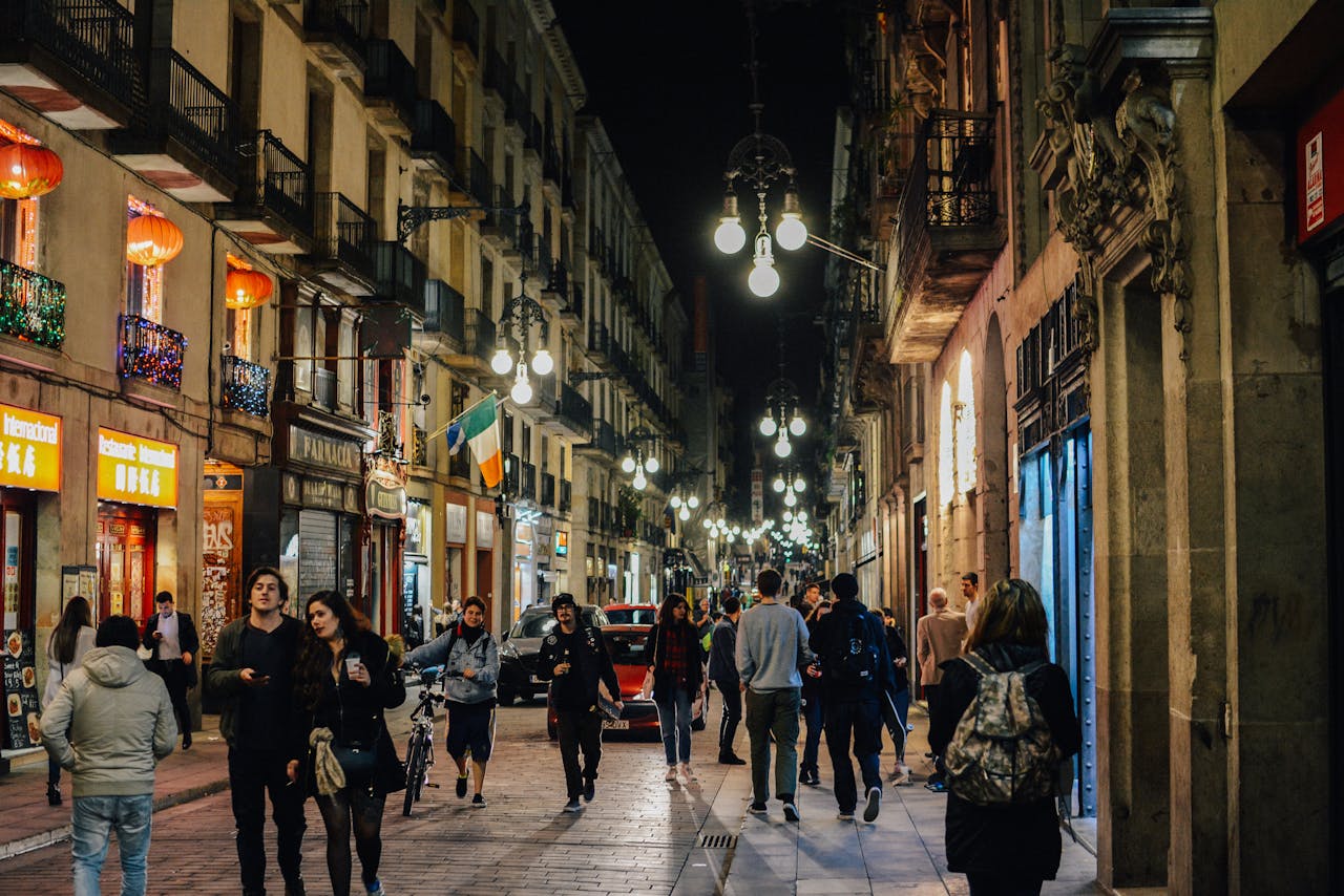 Group of People Near Buildings Barcelona CT Spain
