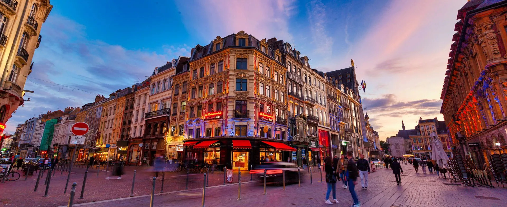 group of people walking in street in Paris